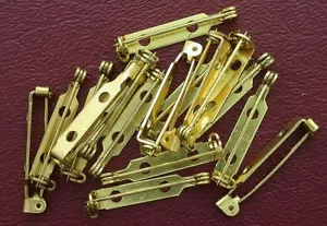 FIFTEEN 1 INCH TWO HOLE GREEN GOLD PIN BARS CF335 - Picture 1 of 1