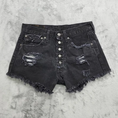 Pantalones cortos Levi's para mujer W31 negros 501 botones expuestos cortados desgastados tiro alto Foto 1 de 4