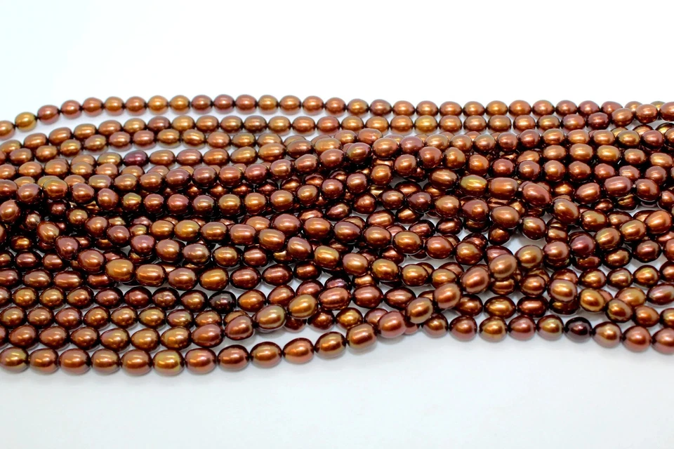 Dark Copper/Reddish Freshwater Pearls Rice/Oval 5mm x 6mm, 0.8mm hole,16 " Str. - Image 1 of 2