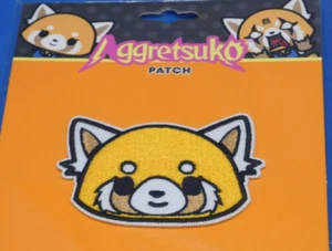 Aggretsuko (Happy) ricamato ferro su toppa Sanrio Neon martedì nuovo - Foto 1 di 4