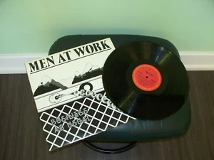 MEN AT WORK..."BUSINESS AS USUAL" - Bild 1 von 4