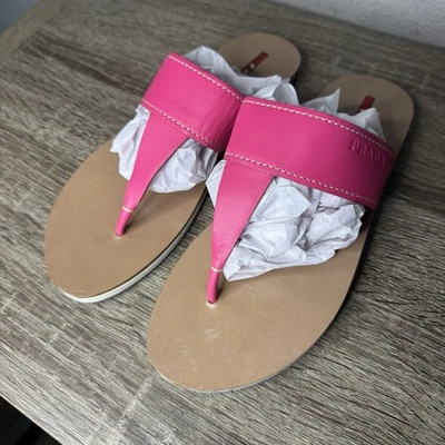 Sandalias de cuero para mujer PRADA rosa brillante tanga 37,5 Italia planas EE. UU. 7 Foto 1 de 4