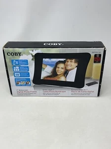 Coby NIB New 7" Widescreen Digital Photo Frame Remote 1GB Built in memory+ Sound - Picture 1 of 7