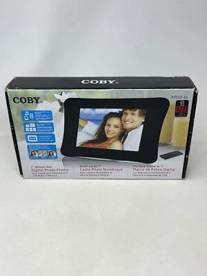 Coby NIB New 7" Widescreen Digital Photo Frame Remote 1GB Built in memory+ Sound - Image 1 of 4