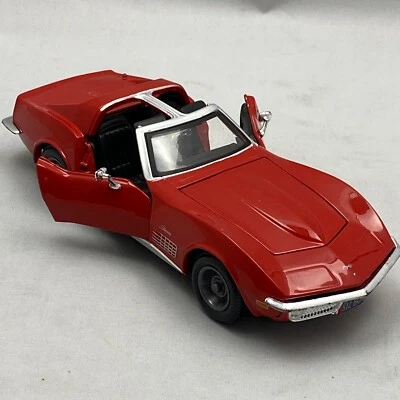 Coche diecast Chevy Corvette Stingray 1999 Maisto 8" 1970 1:24 rojo techo en T vintage Foto 1 de 4