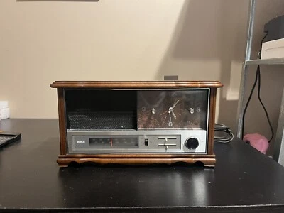 Vintage 1970 RCA AM FM Radio Alarm Clock Model RWS 494F Fruit Wood Finish - Image 1 of 4