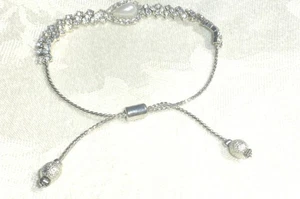 SCHÖNES SILBERFARBENES STRASS KUNSTPERLEN BOLO ARMBAND TOLL VERSTELLBAR - Bild 1 von 4