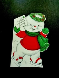 1 biglietto di auguri vintage Marjorie Cooper Natale pupazzo di neve più carino in abito da festa e ⛸️ - Foto 1 di 3