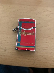 VINTAGE OLD RARE PETROL LIGHTER ZENITH WINDPROOF WITH LOGO HOLLYWOOD CIGARETES - Picture 1 of 4