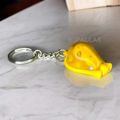 TUPPERWARE SCHLÜSSELANHÄNGER MESSER-MAUS ORANGE - Bild 1 von 2