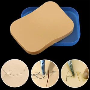Almohadilla de entrenamiento de sutura de silicona práctica médica quirúrgica incisión modelo de piel humana - Imagen 1 de 12