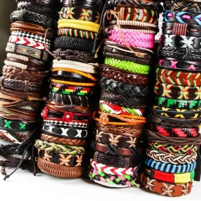 Venta al por mayor 100 piezas Pulseras Retro Hechas a Mano Cuero Genuino Surfer Brazalete Pulseras Foto 1 de 4
