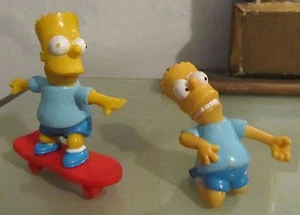 Bart Simpson 2 action figure anni 90 in PVC Skate e Air Guitar giochi preziosi - Imagen 1 de 1