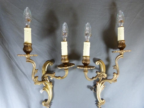 Pair of Rococo style gilt bronze wall sconces by PETITOT (France) Cover