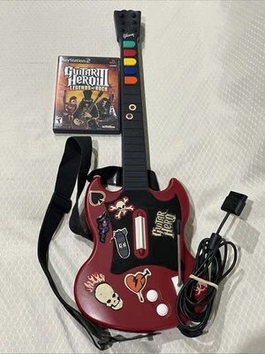 Guitar Hero Gibson SG Rojo Octano Controlador con Cable Playstation 2 Ps2 Con Juego Foto 1 de 4