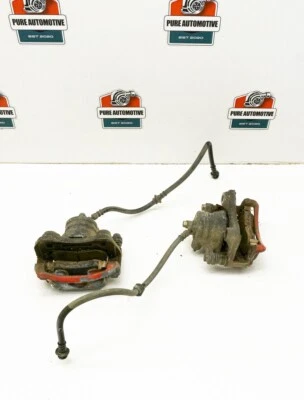 Pinza de freno delantera Nissan 240SX Silvia S14 1995-1998 par de pistones únicos L R OEM Foto 1 de 4