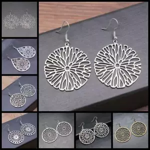 Orecchini pendenti fiori intagliati - orecchino goccia stile vintage donna gioielli cavi - Foto 1 di 28