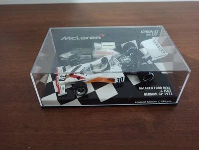 F1 MINICHAMPS 1/43 MCLAREN FORD M23 J. HICKS GERMAN GP 1973 - Immagine 1 di 4