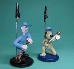 2er SET MEMO CLIP WALLACE & GROMIT ZETTELHALTER TRUCKER BIKER PIN UP GIRL FIGUR! - Bild 1 von 6