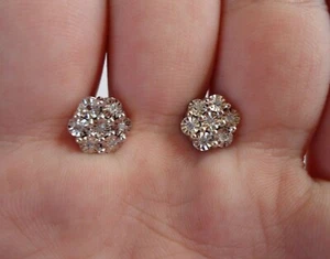GENUINE DIAMOND FLOWER DESIGN STUD EARRINGS W/ .12 CT DIAMONDS/ STERLING SILVER - Picture 1 of 4