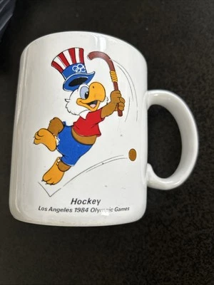 TAZA TAZA DE CAFÉ PAPEL HOCKEY ÁGUILA CALVA JUEGOS LOS ANGELES 1984 OLÍMPICOS EE. UU. Foto 1 de 4
