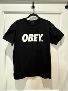 Obey Men's MEDIUM T-Shirt, Black with Company Spellout Across the Front - Picture 1 of 6