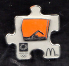 ATHENS 2004 OLYMPICS SPONSOR PIN MACDONALDS. 1 PIN FROM A PUZZLE SET. SWIMMING