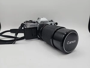 Canon AE-1 analoge manuelle Spiegelreflexkamera 35 mm mit Zwillinge 1:4,5 80-200 Zoomobjektiv LESEN - Bild 1 von 11