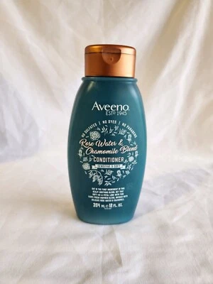 Acondicionador Aveeno Mezcla Agua de Rosas y Manzanilla Sin Sulfatos con Avena Coloidal Foto 1 de 2