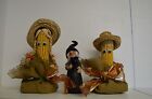 Two corn heads made of real ears of corn 11" tall and wooden black witch 8" tall