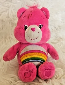Peluche Care Bears Cheer Rainbow Pink Hearts DEFECTUOSO - Imagen 1 de 5