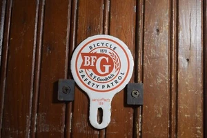 BF GOODRICH BICYCLE SAFETY PORCELAIN METAL LICENSE PLATE TOPPER SIGN DAY GLO 129 - Picture 1 of 15