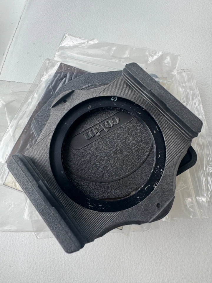 COKIN A FILTER HOLDER 49MM + FILTERS 81B, PRESHAPED FRAMES 80A - Image 1 of 4