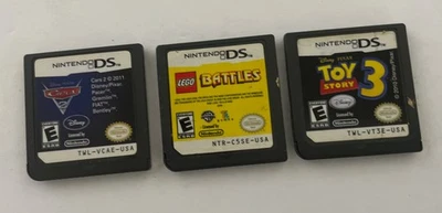 Lote de 3 cartuchos de jogos para Nintendo DS somente Toy Story 3, carros, batalhas Lego - Imagem 1 de 4