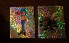 (2) 2000 Digimon foil Stickers.