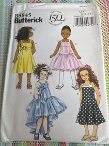 Prendisole bambina Butterick #B5845 taglia 2-5 fiori non tagliato - Foto 1 di 2
