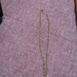 10k gold bracelet. 10.5 In Long.  1.0 Grams.  Marked. - Picture 1 of 6