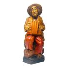 Vintage Wood Hand Carved and Painted Peasant Accordion Player Seated on a Bench