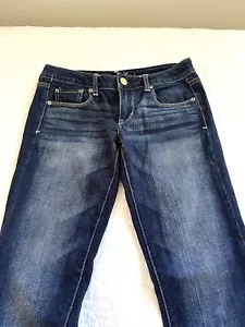 Pantalones de mezclilla American Eagle Outfitters ajustados elásticos azules con botones de 5 bolsillos para mujer 4 largos - Imagen 1 de 12