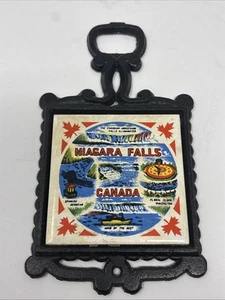 Copriletto vintage in ghisa con piastrella Niagra Falls Canada grafica ceramica - Foto 1 di 6
