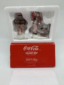 DEPARTAMENTO 56 COCA COLA ENTREGA HOMBRE COLECCIONABLE PUEBLO DE NIEVE NUEVAS FIGURAS SELLADAS DE COLECCIÓN - Imagen 1 de 2