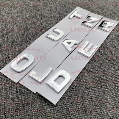 Capó capó plateado cromo emblema insignia deportiva para Mitsubishi Outlander 2022-2025 Foto 1 de 4