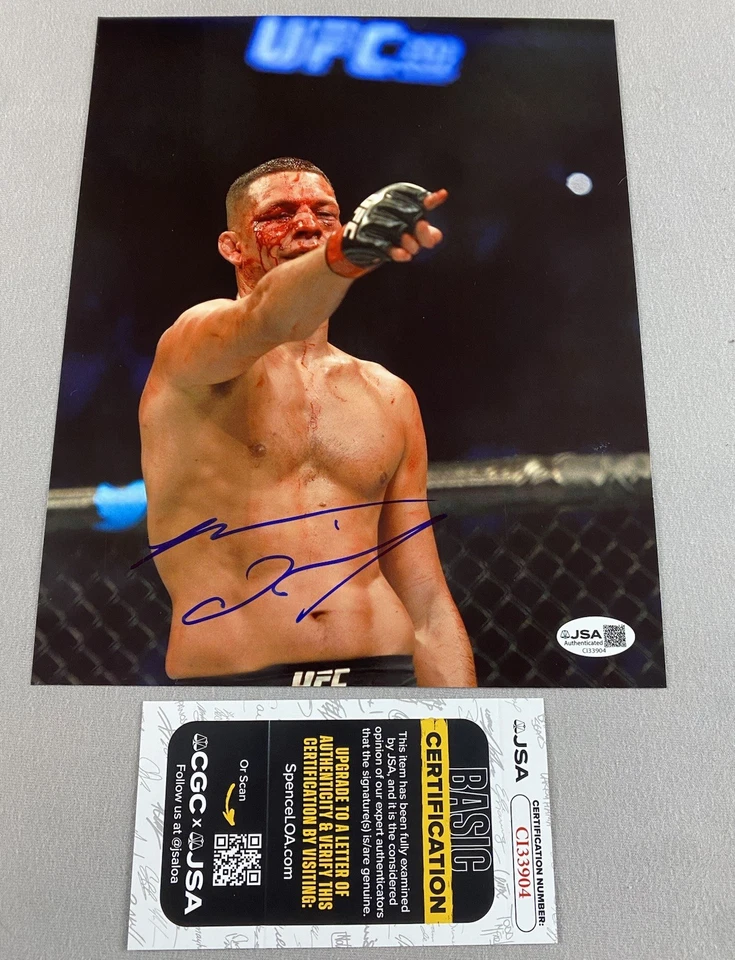 UFC STAR- NATE DIAZ AUTOGRAPH 8x10 FIGHT BLOOD ACTION PHOTO UFC/MMA JSA CI33904 - Image 1 of 1