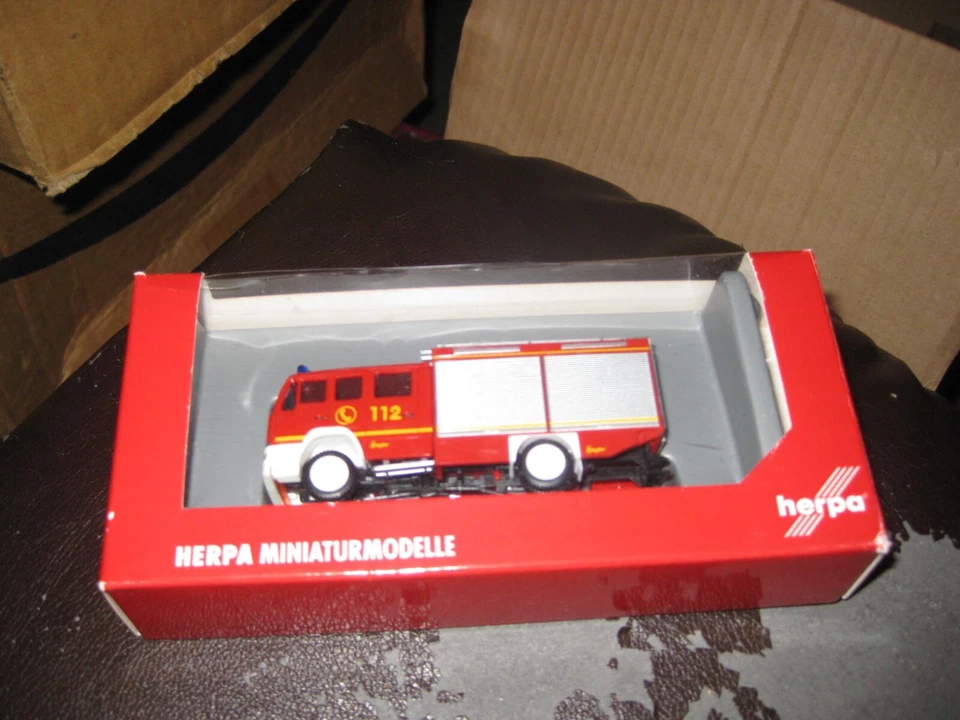 Camión de bomberos MAN L 2000 FW de Herpa como nuevo en caja escala 1/87 Foto 1 de 1