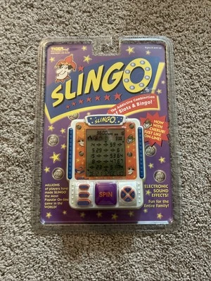 SLINGO Tiger 2000 portátil electrónico LCD JUEGO RARO VARIANTE QUERUBÍN SELLADO NUEVO Foto 1 de 4