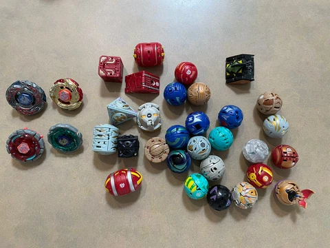 Bakugan Battle Lot of 29 Figures 20 Cards 24 Metal Cards 4 Beyblades Rulebook Cover
