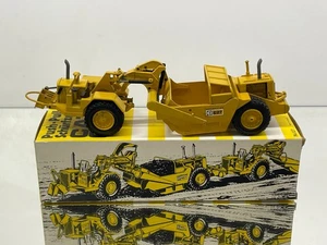 NZG 127 CATERPILLAR CAT 627 SCRAPER PUCH-PULL -YELLOW 1:50- GOOD IN BOX - Picture 1 of 9