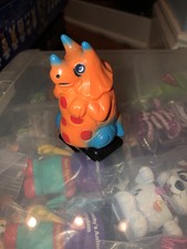 Vintage 1991 Dinosaur Triceratops Ramp Walker Rock N Walk Wind Up Walker Toy