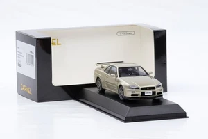 1:43 Carnel Di Kyosho Nissan Skyline Nür GT-R Mspec BNR34 2002 Silica Brass - Foto 1 di 4