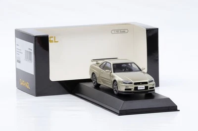 1:43 Carnel Di Kyosho Nissan Skyline Nür GT-R Mspec BNR34 2002 Silica Brass - Immagine 1 di 4